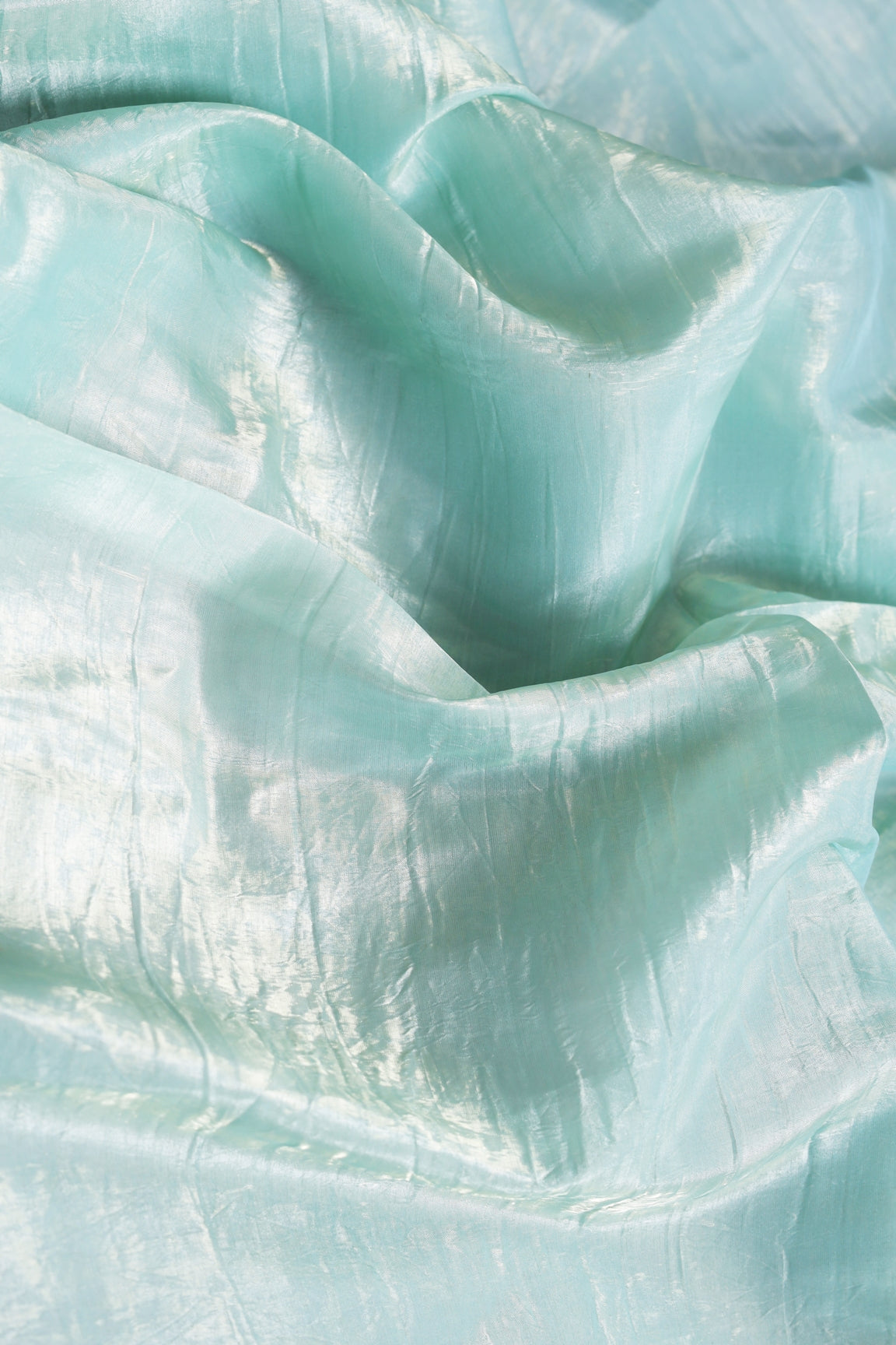 Elegant Ice Blue Tissue Silk Crunchy Party Wear Saree