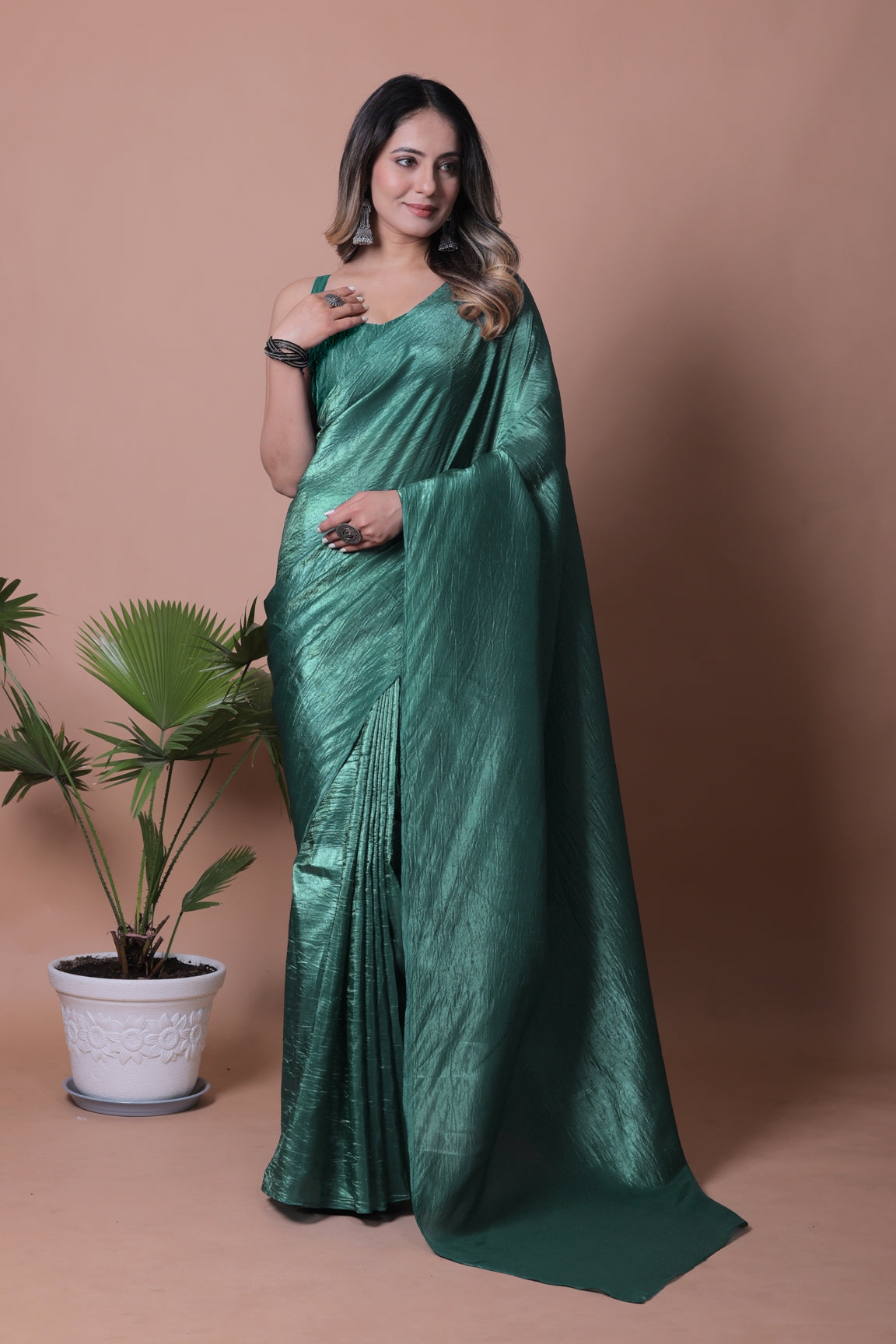Elegant Emerald Green Tissue Silk Crunchy Party Wear Saree