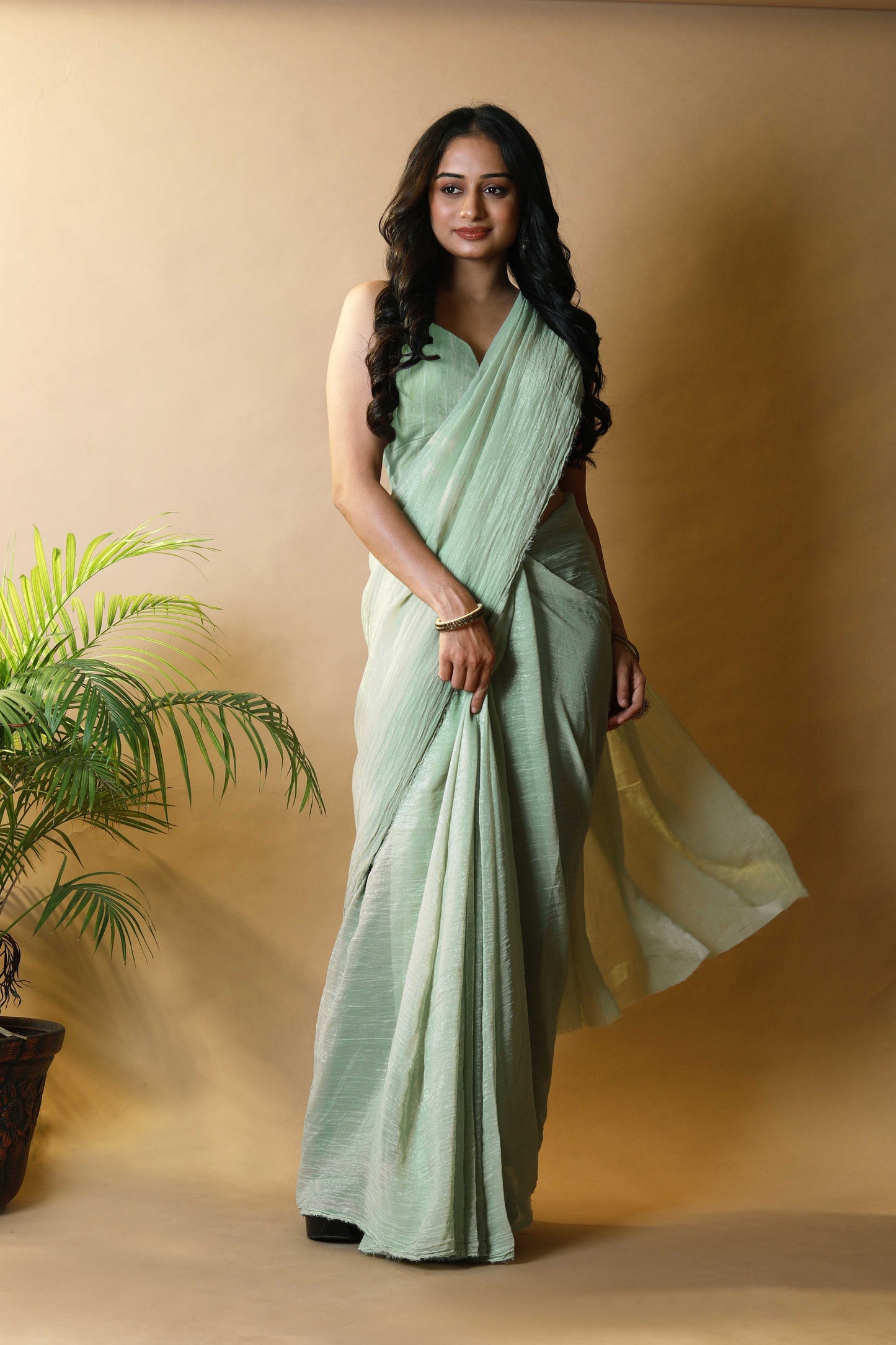 Elegant Pista Green Shimmer Tissue Silk Crunchy Party Wear Saree
