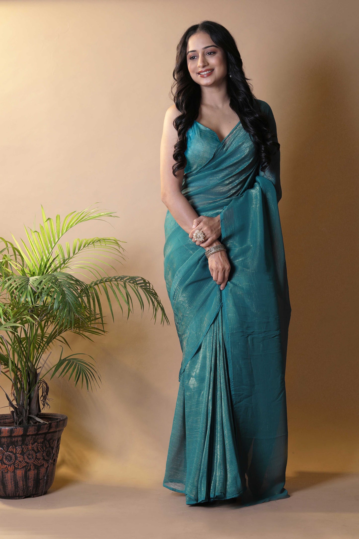 Elegant Bottle Green Shimmer Tissue Silk Crunchy Party Wear Saree