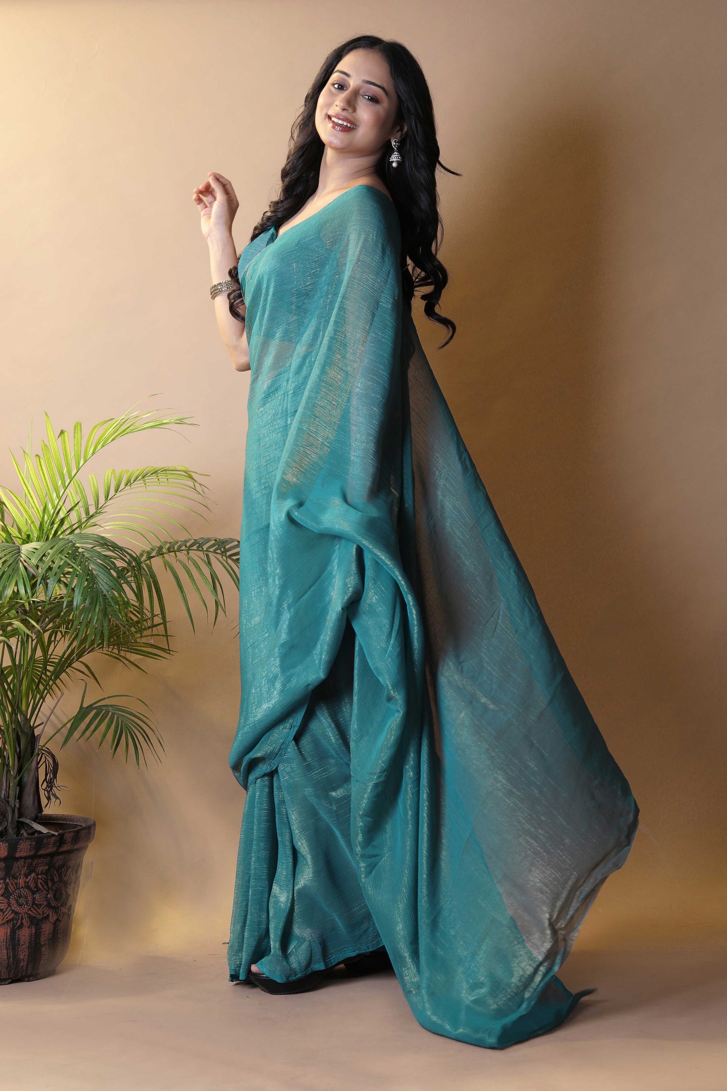 Elegant Bottle Green Shimmer Tissue Silk Crunchy Party Wear Saree