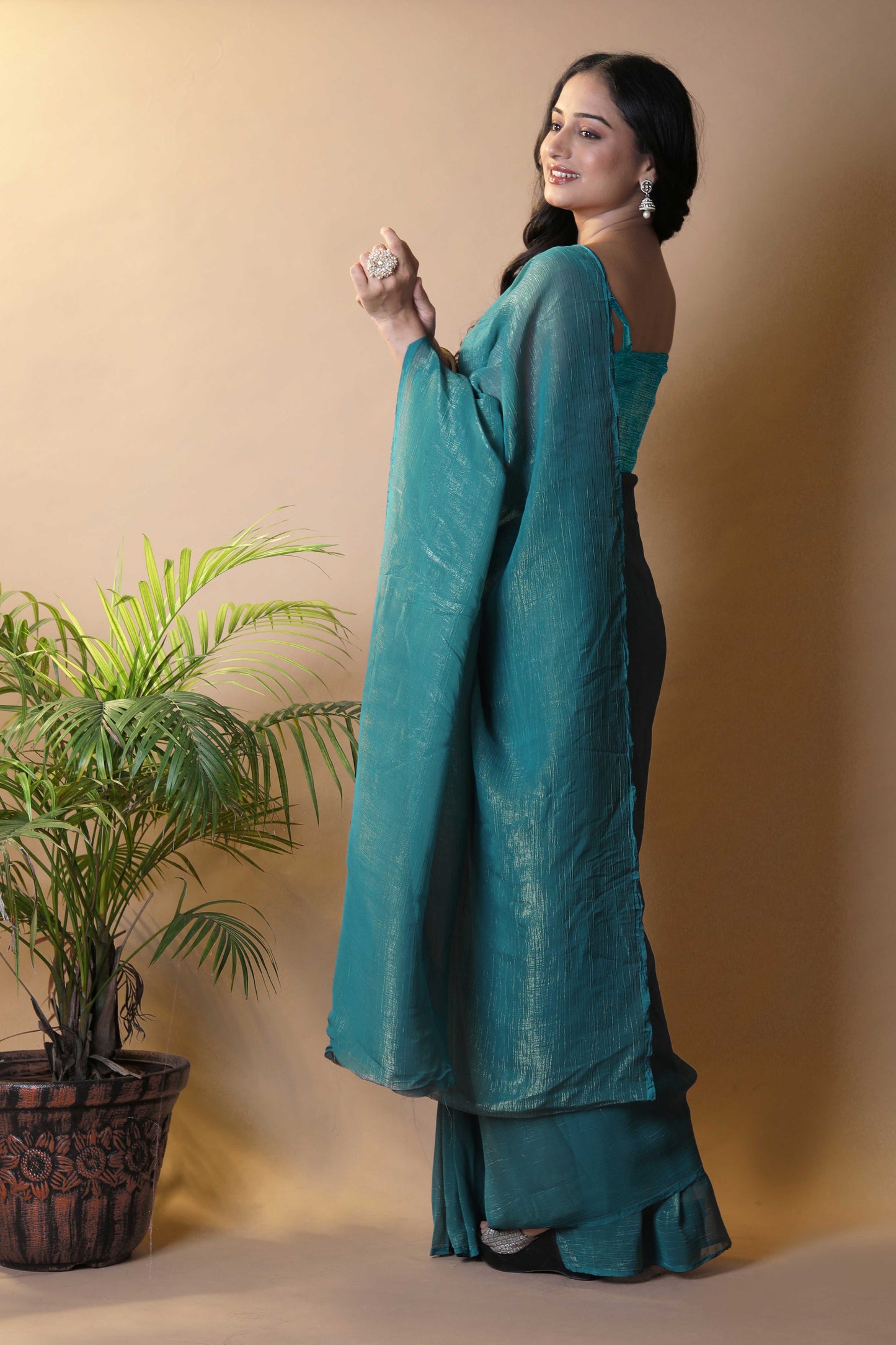Elegant Bottle Green Shimmer Tissue Silk Crunchy Party Wear Saree