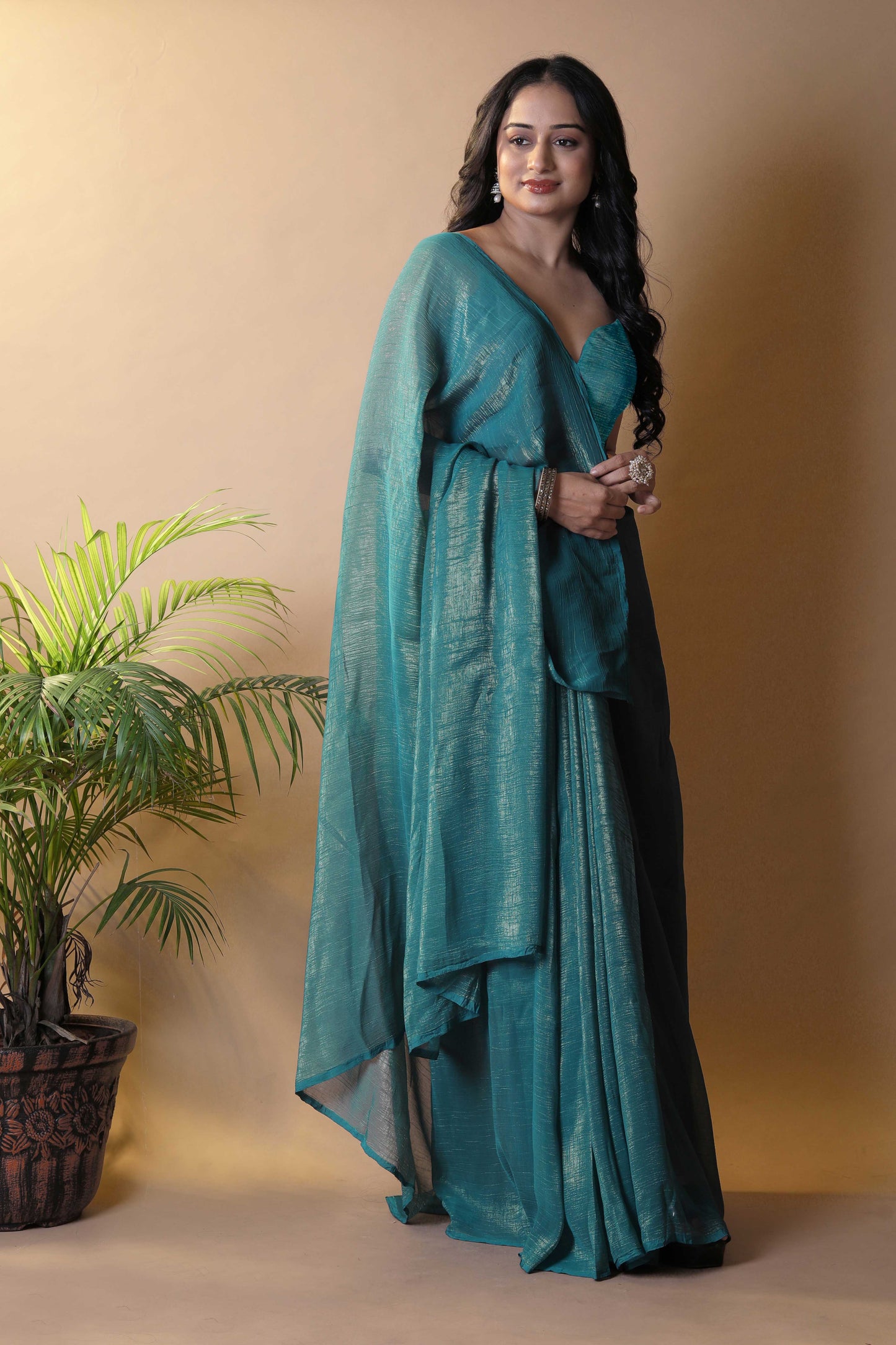 Elegant Bottle Green Shimmer Tissue Silk Crunchy Party Wear Saree