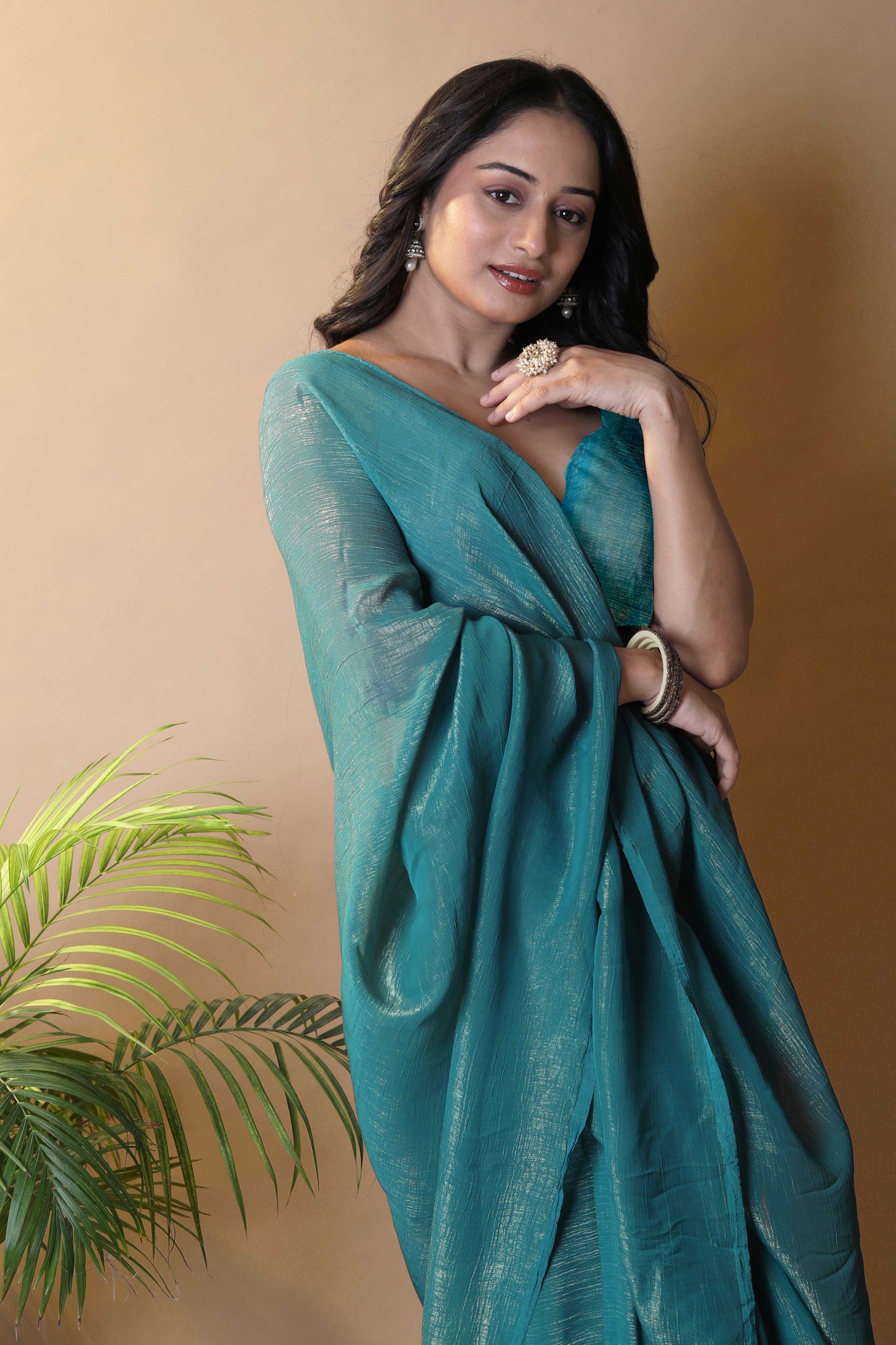 Elegant Bottle Green Shimmer Tissue Silk Crunchy Party Wear Saree