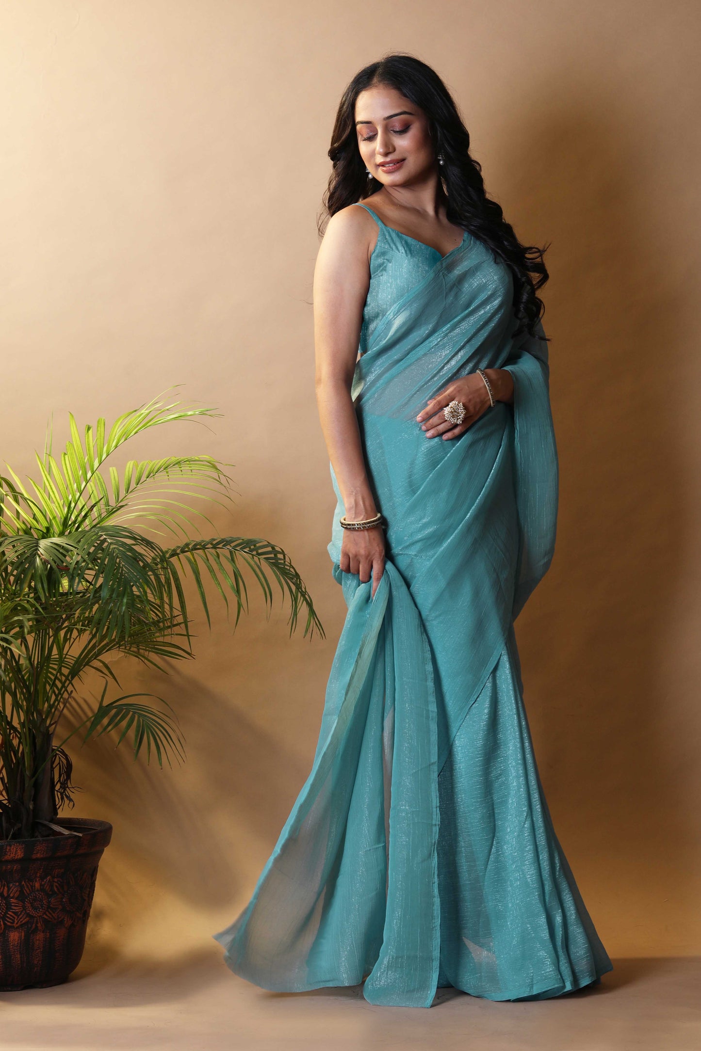 Elegant Sea Green Shimmer Tissue Silk Crunchy Party Wear Saree