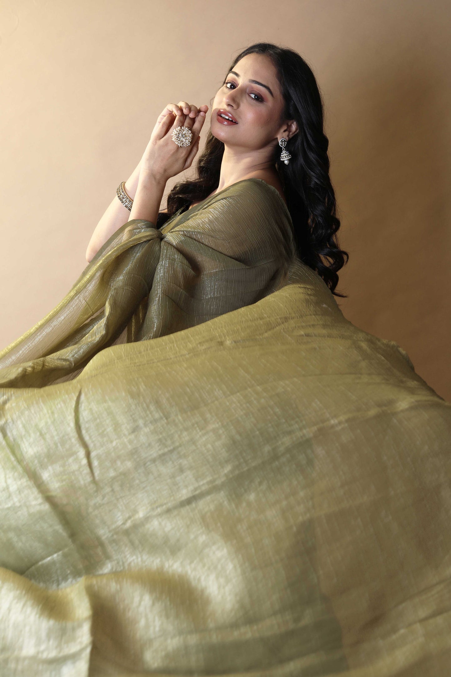 Elegant Olive Green Shimmer Tissue Silk Crunchy Party Wear Saree
