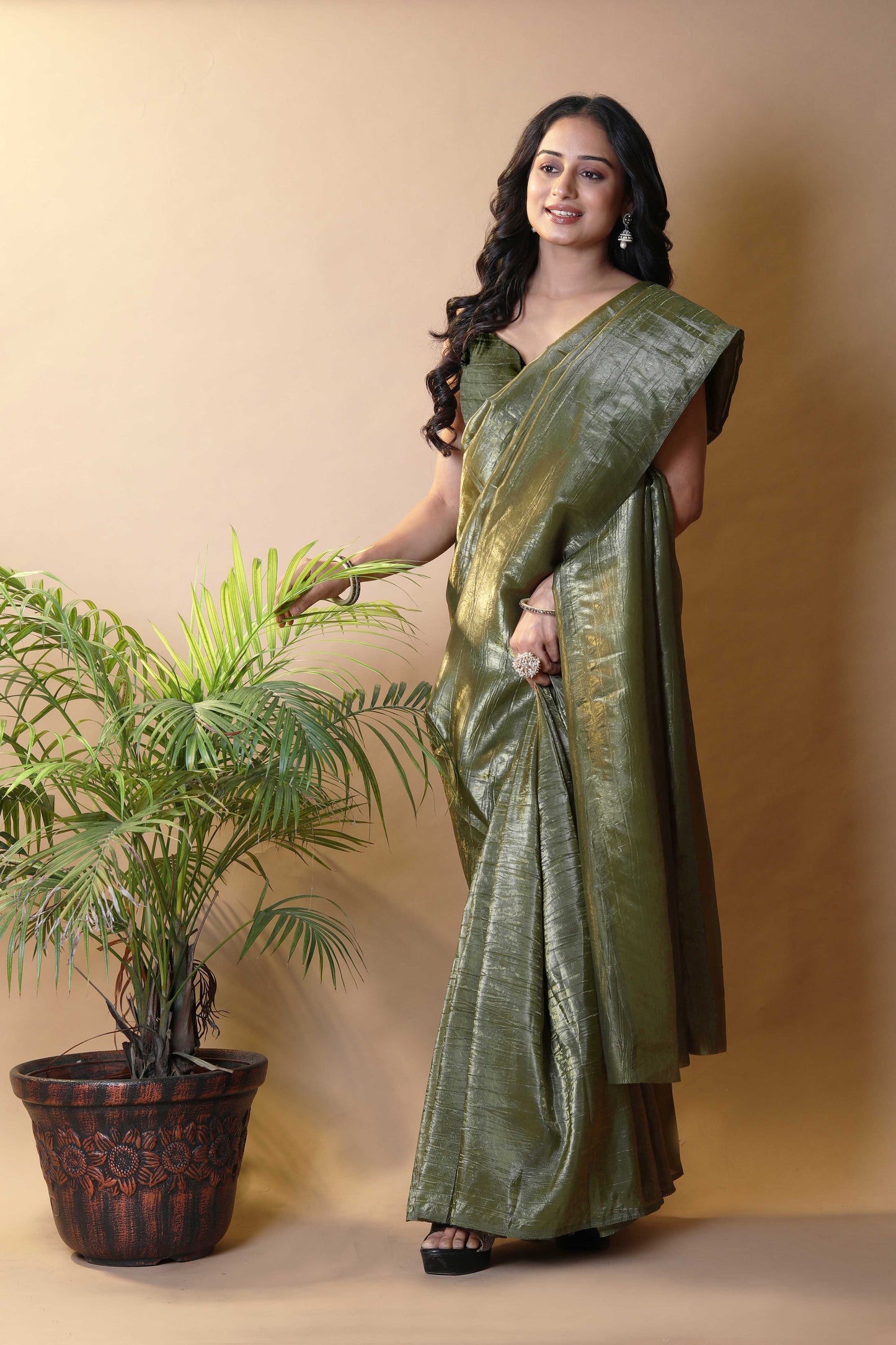 Elegant Mehendi Green Tissue Silk Crunchy Party Wear Saree