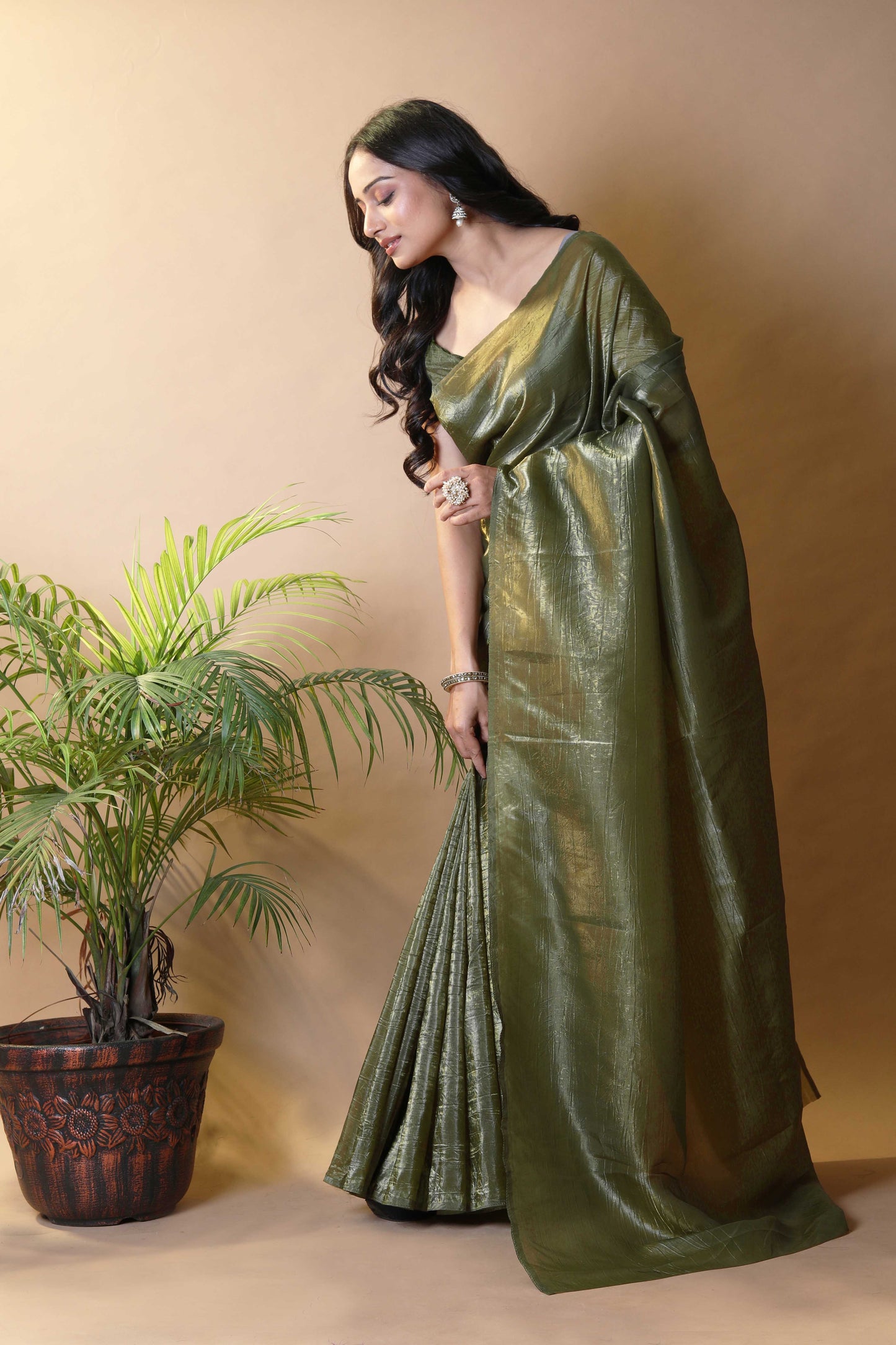 Elegant Mehendi Green Tissue Silk Crunchy Party Wear Saree