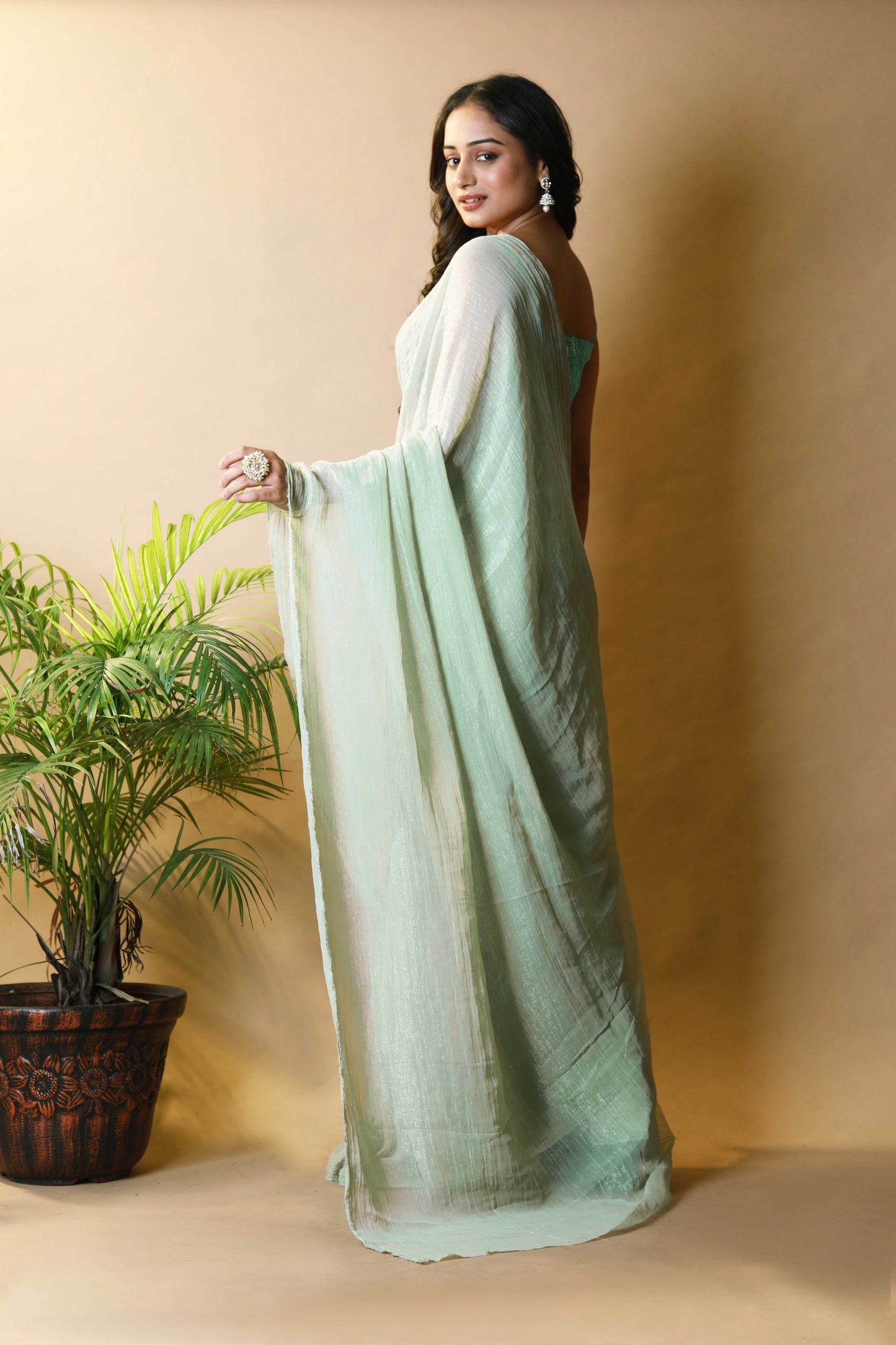 Elegant Pista Green Shimmer Tissue Silk Crunchy Party Wear Saree