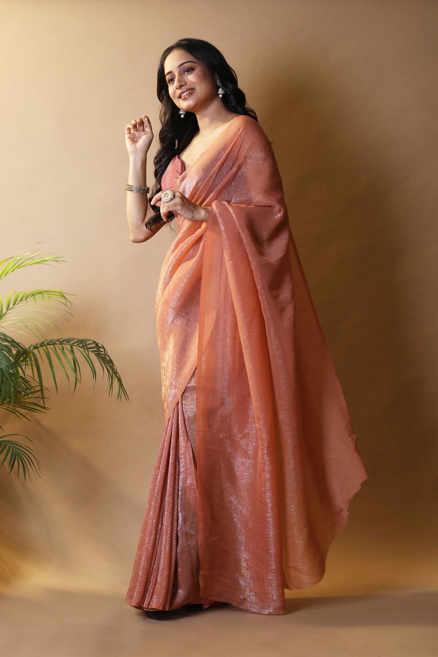 Elegant Rust Shimmer Tissue Silk Crunchy Party Wear Saree