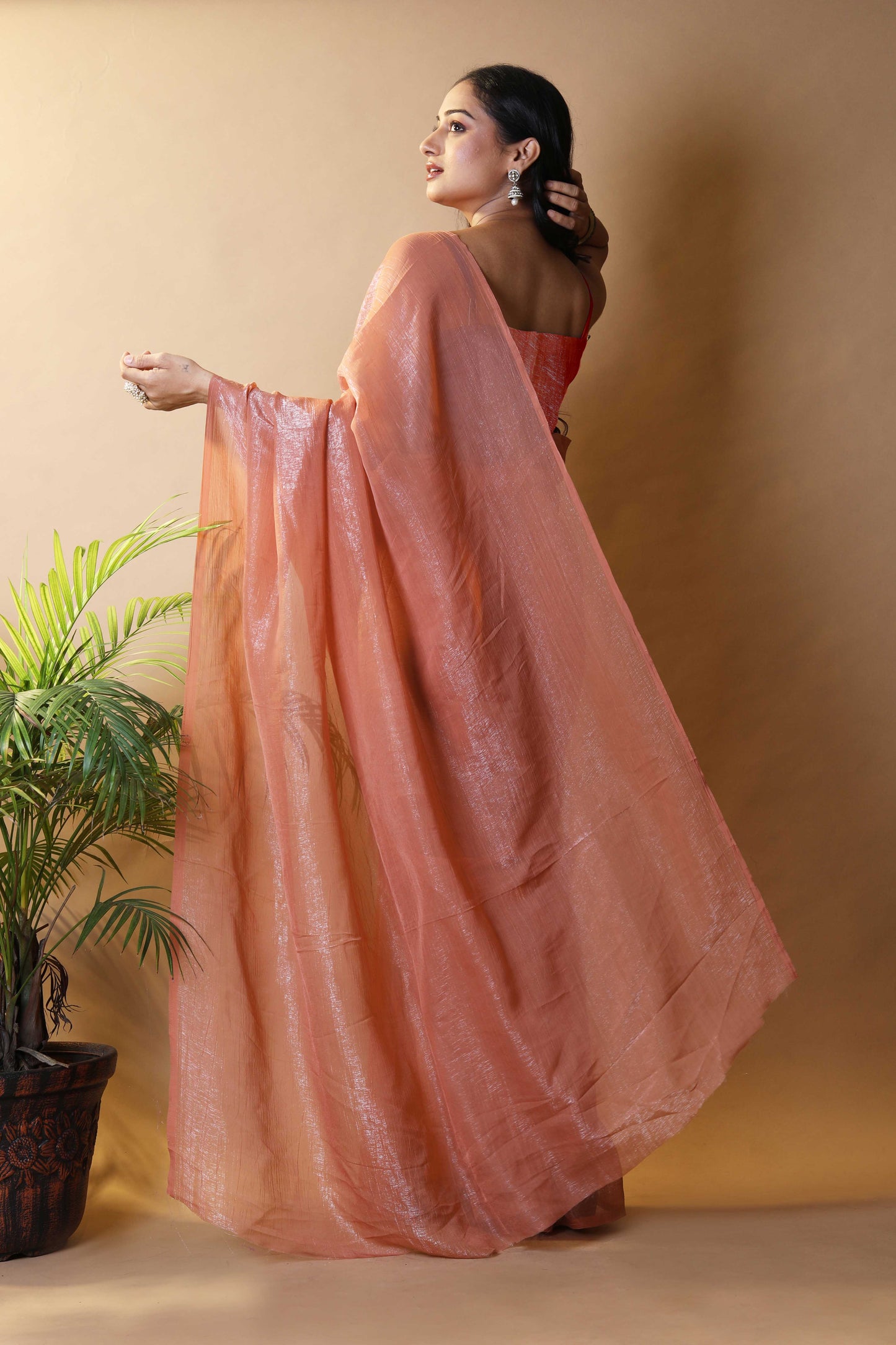 Elegant Rust Shimmer Tissue Silk Crunchy Party Wear Saree